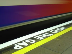 A tube platform with the sign 'mind the gap' on it