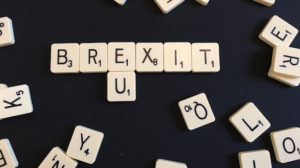 Scrabble pieces spelling out Brexit
