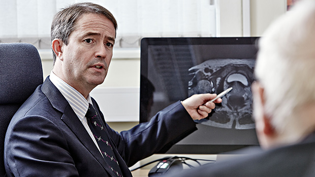 Doctor discussing a prostate cancer scan with patient