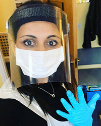 Anisha wearing PPE