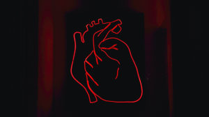 Black and red photo of a heart icon