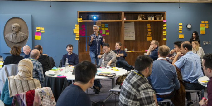 Researchers gather to generate ideas at a sandpit workshop