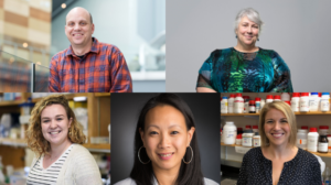 Cancer researchers smiling at the camera