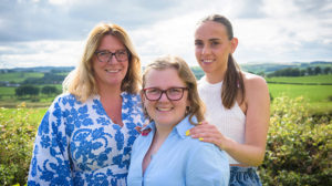 A photo of Katie Currie with her mum and sister