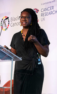 Dr Faith Uwadiae presenting at the Black in Cancer conference