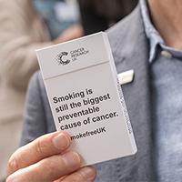 A cigarette packet which says 'Smoking is the biggest preventable cause of cancer' for our SmokeFree campaign