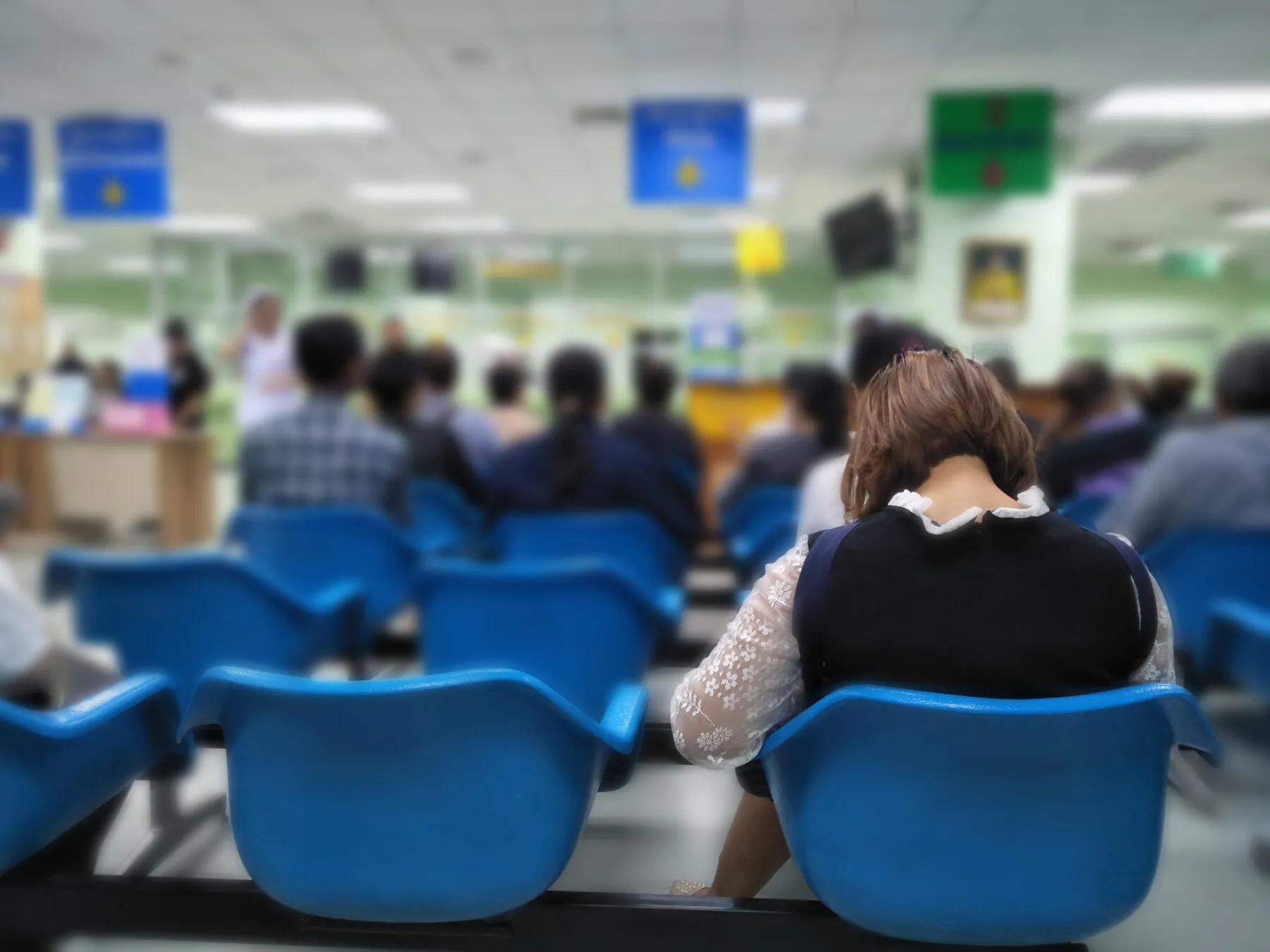 Woman waiting in hospital waiting room