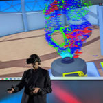 Dr Dario Bresson, head of the IMAXT lab, investigates an early stage breast cancer through VR.