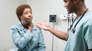 A black woman at a doctor's appointment