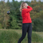 Lysa Jones swinging a golf club