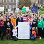 One Cancer Voice campaigners pictured with Steve Brine MP, Chair of the Health and Social Care committee, and a copy of the petition