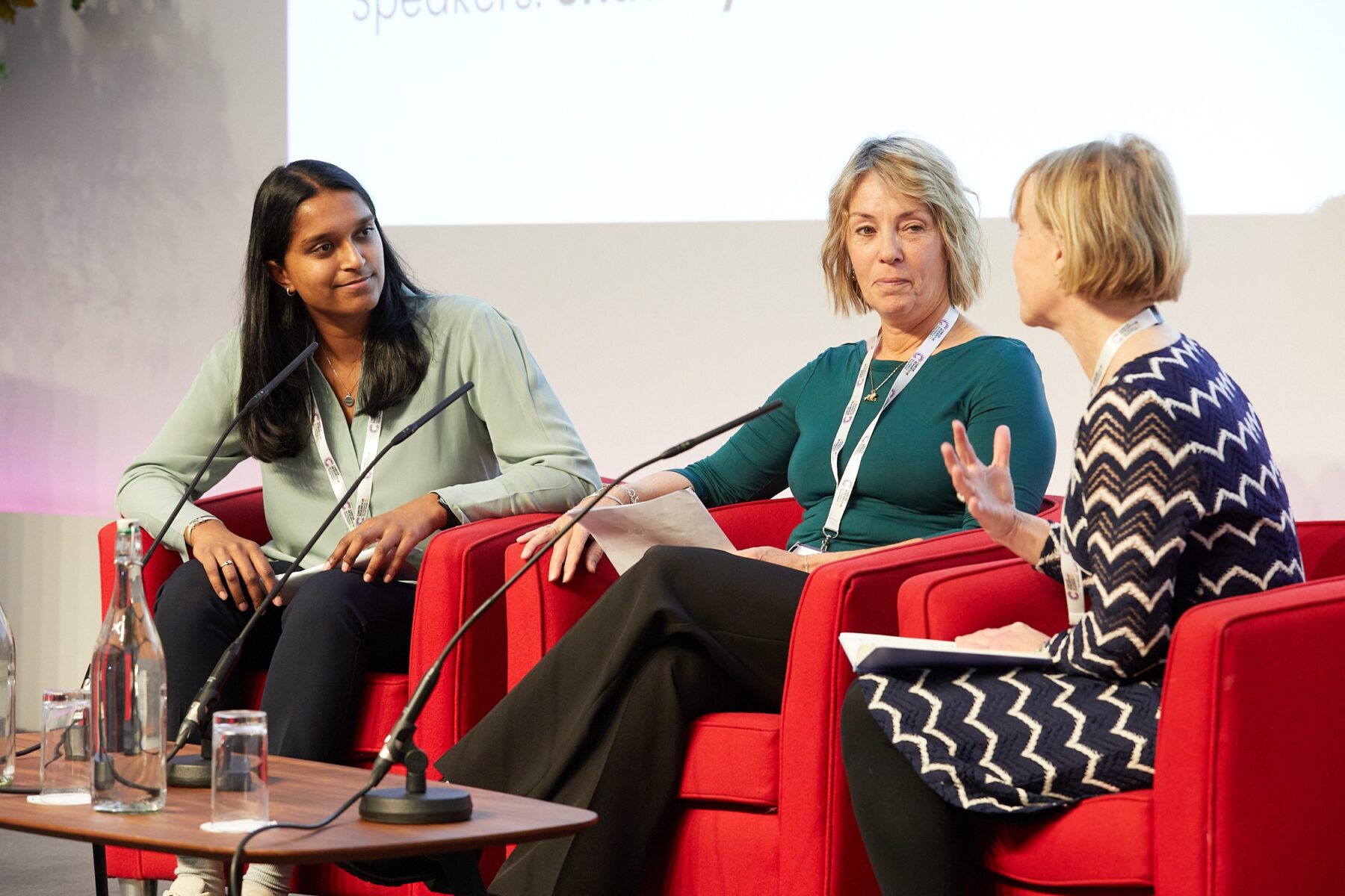 From left: Shaumya, Sarah and Dr Catherine Elliott (Director of research and partnership at Cancer Research UK) talking