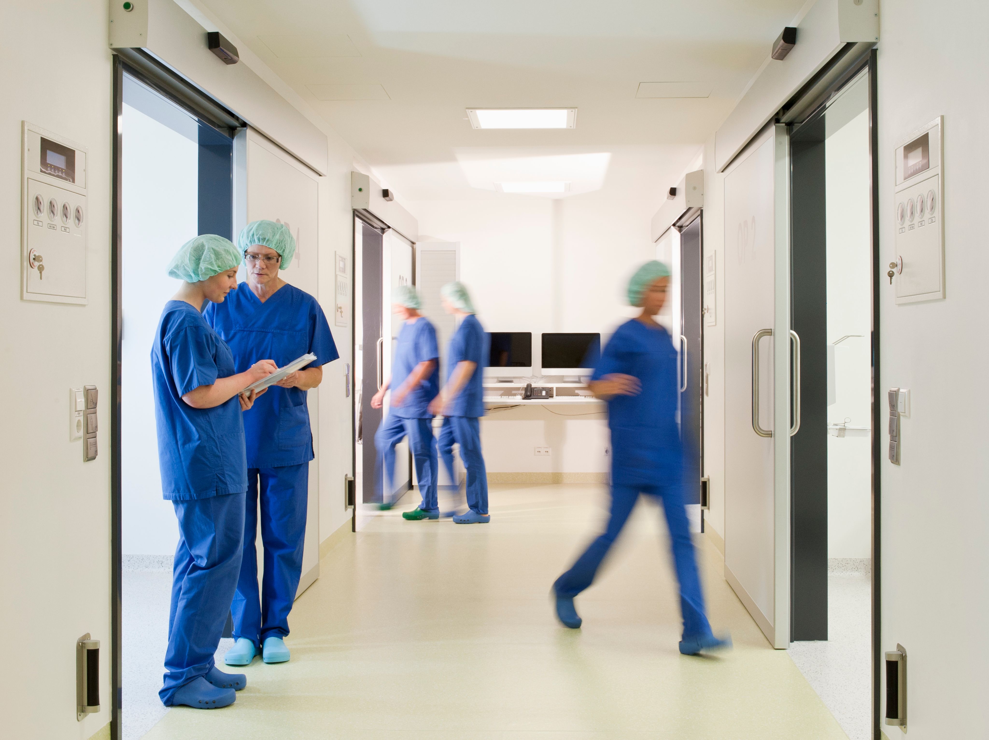 Hospital staff in a hospital corridor