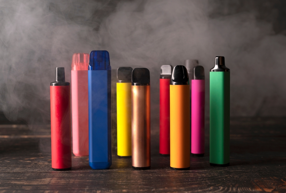 Several disposable e-cigarettes in different colours