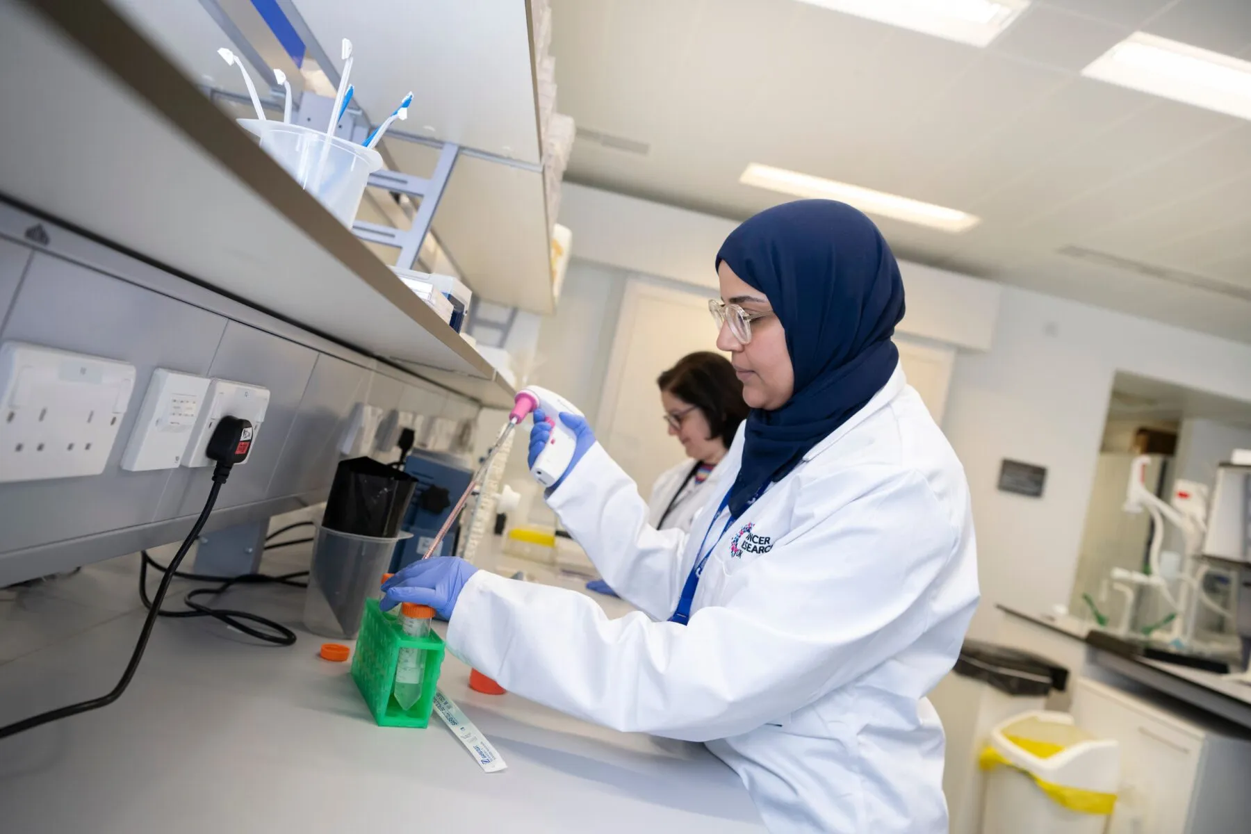 Researchers working in the lab at CRUK's Scotland Institute