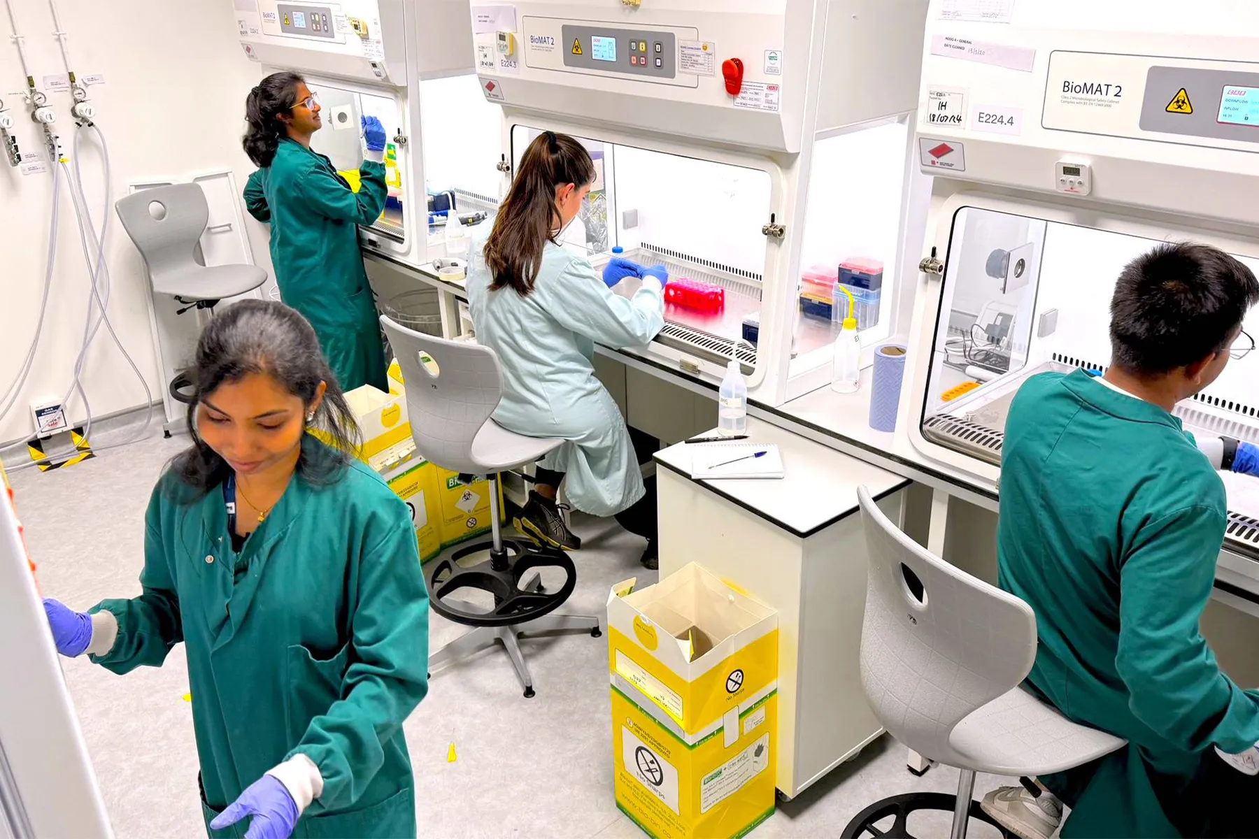 A group of postgraduate researchers working in a laboratory at the University of Nottingham.