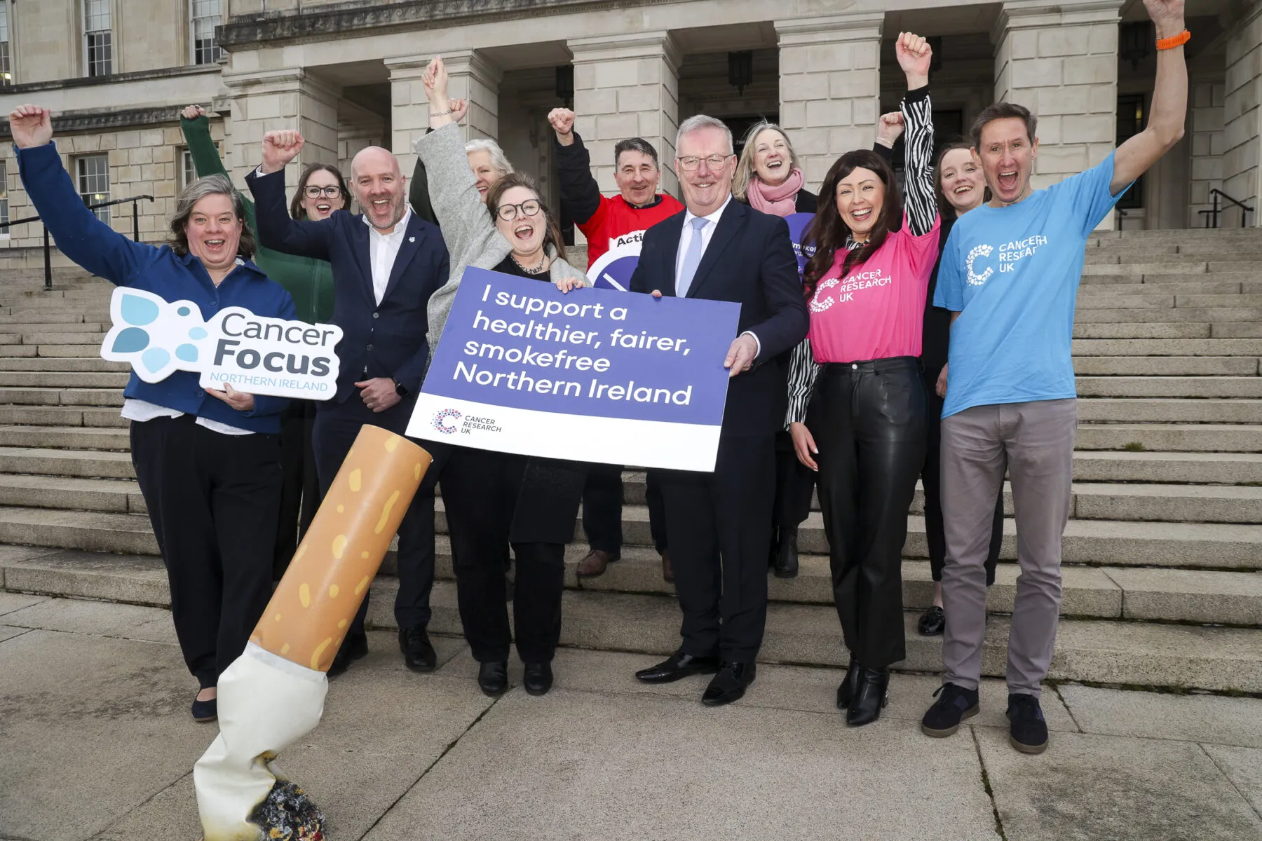 Cancer Research UK staff and supporters celebrating in Northern Ireland