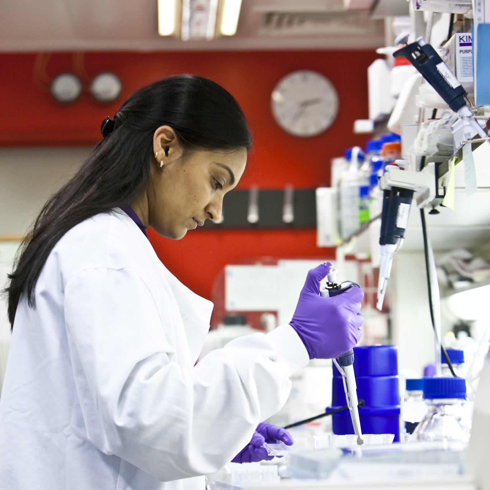 A Cancer Research UK researcher working in a lab