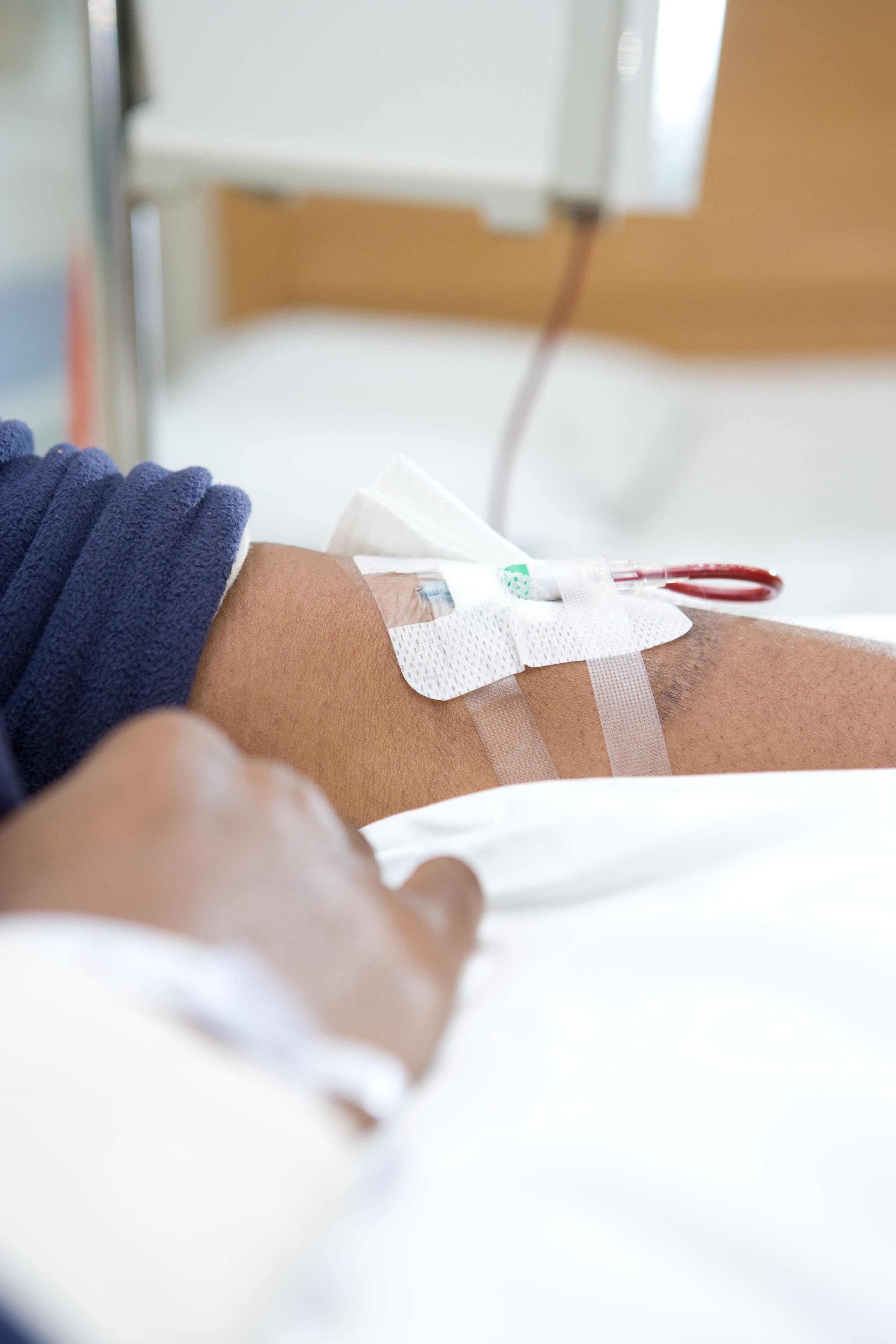 a patient receiving intravenous drugs