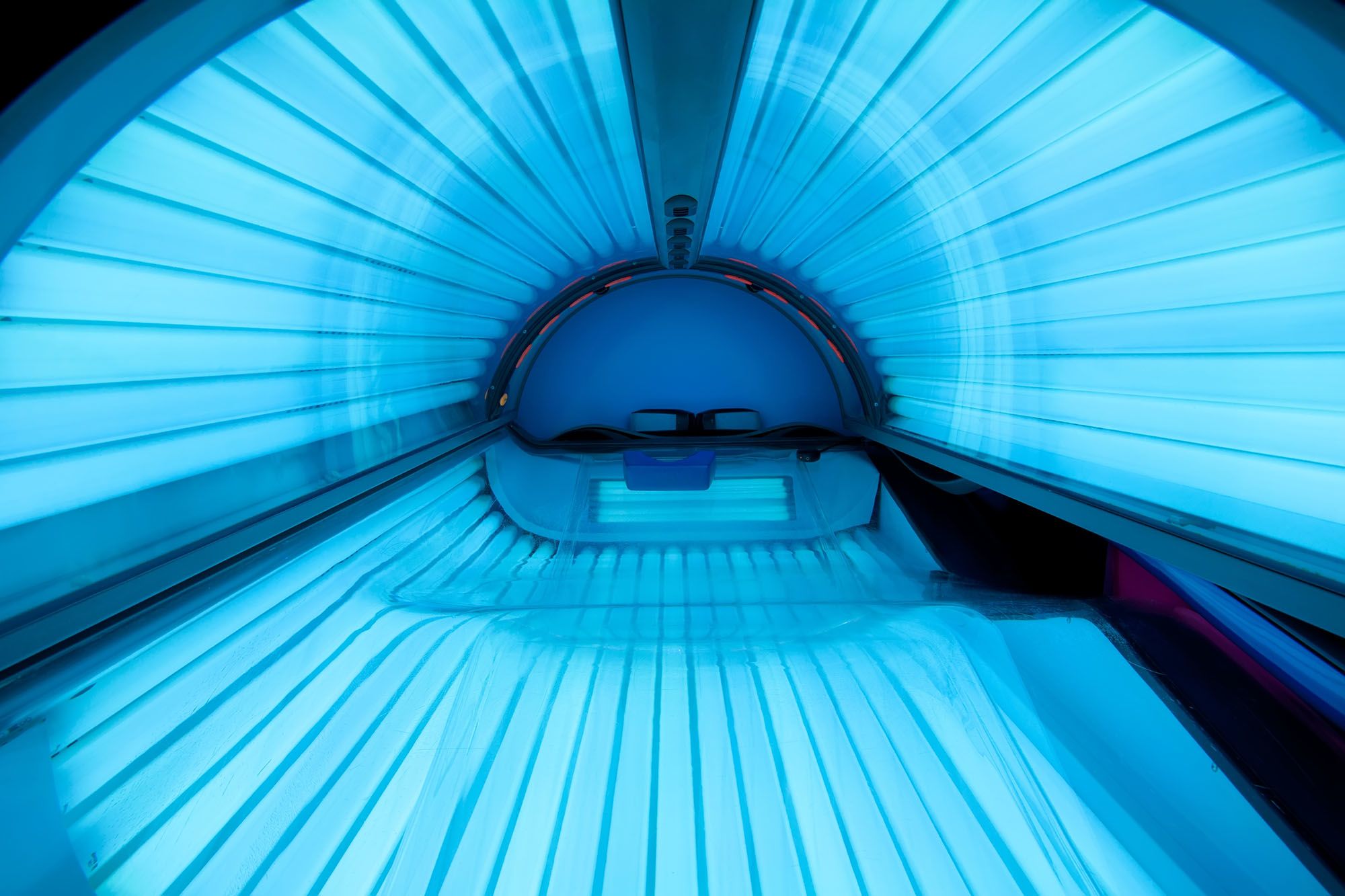 The inside of a tanning bed.