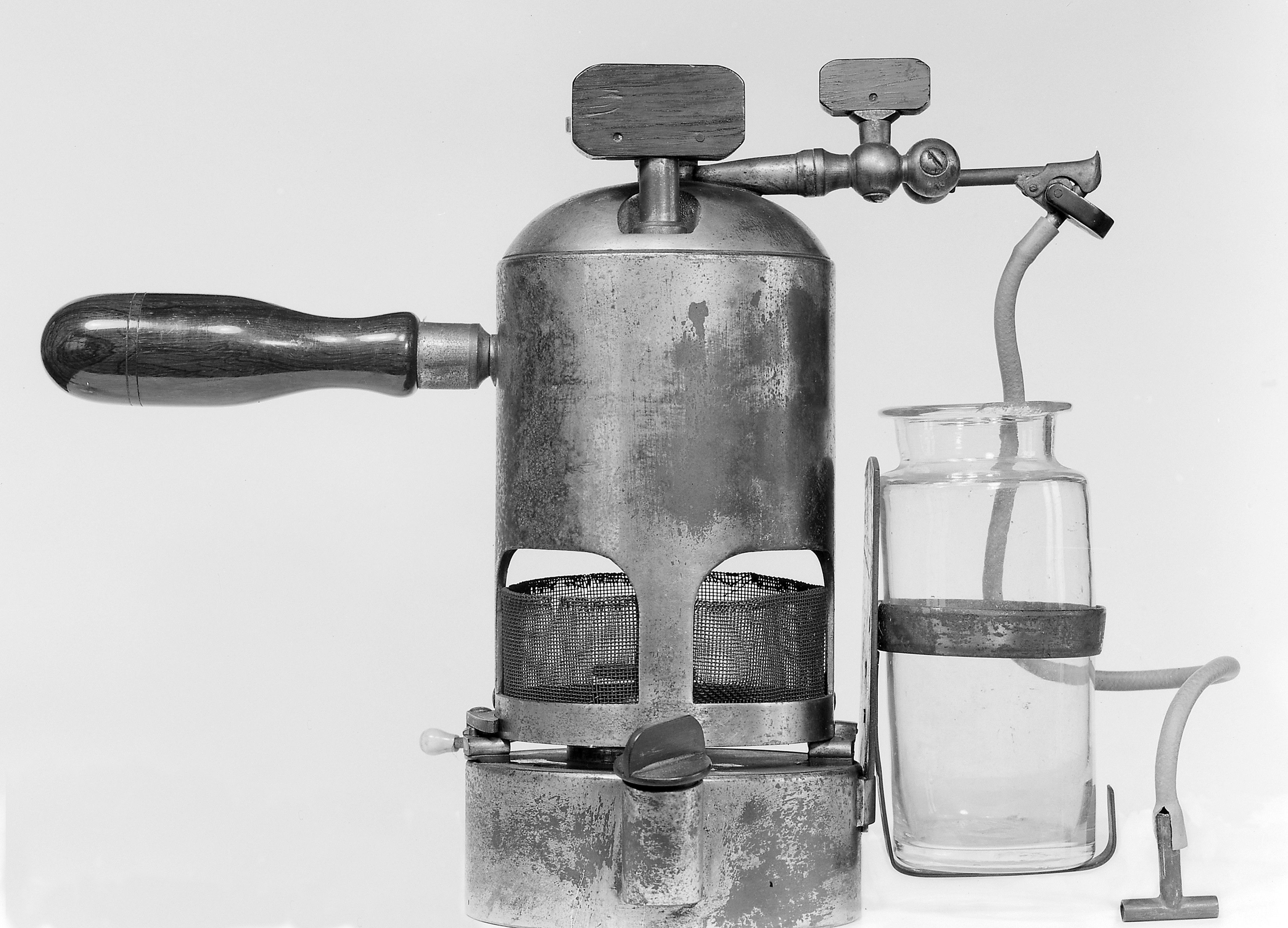 Old metal spray bottle.