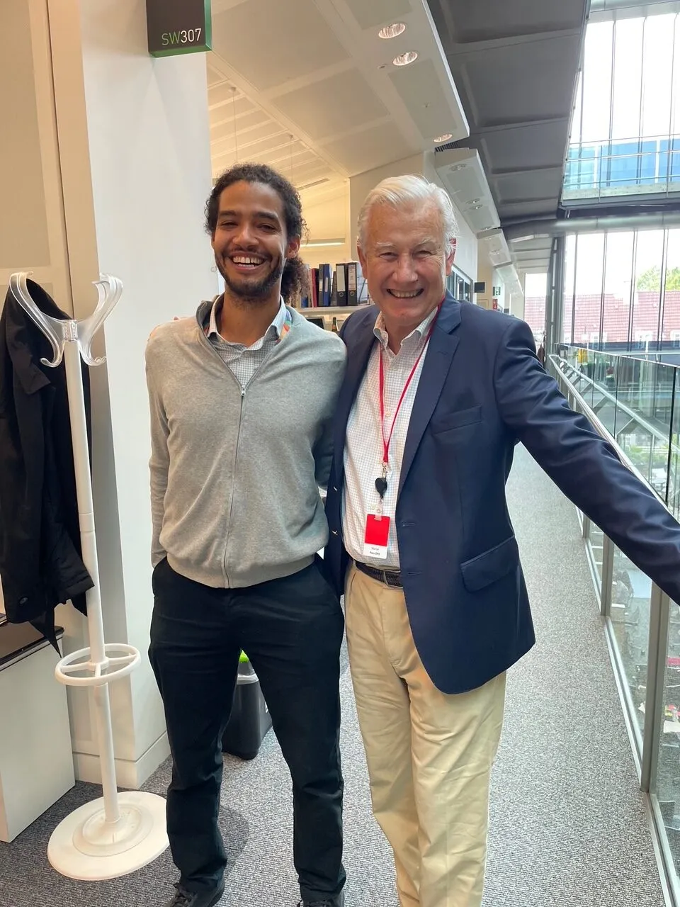 Edward (right) remained closely connected to the Crick's mission, visiting the institute to meet scientists such as Chris Bailey (left) and hear about the progress of their research. Credit: Edward Speed