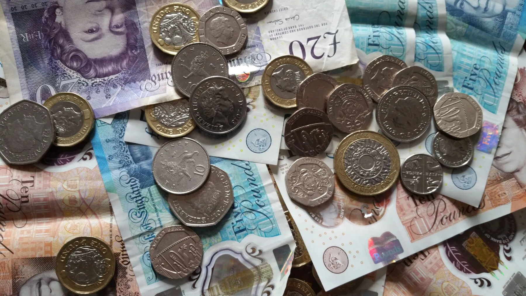 various pound notes and coins